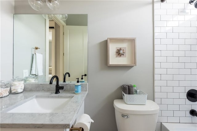415 N Dupre St, New Orleans, LA 70119 - bathroom with toilet, vanity, and washtub / shower combination