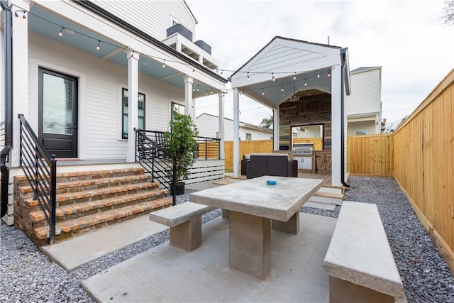 415 N Dupre St, New Orleans, LA 70119 - fenced backyard with outdoor dining space and a patio
