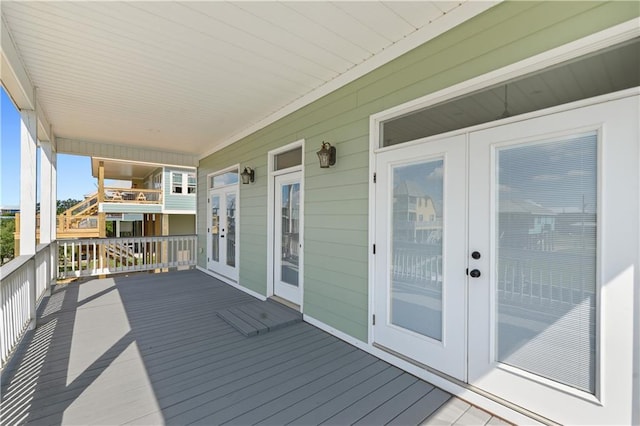 4027 Borneo St, Bay Saint Louis, MS 39520 - wooden deck with french doors