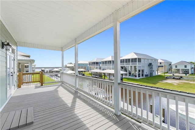 4027 Borneo St, Bay Saint Louis, MS 39520 - deck with a residential view, a water view, and a yard