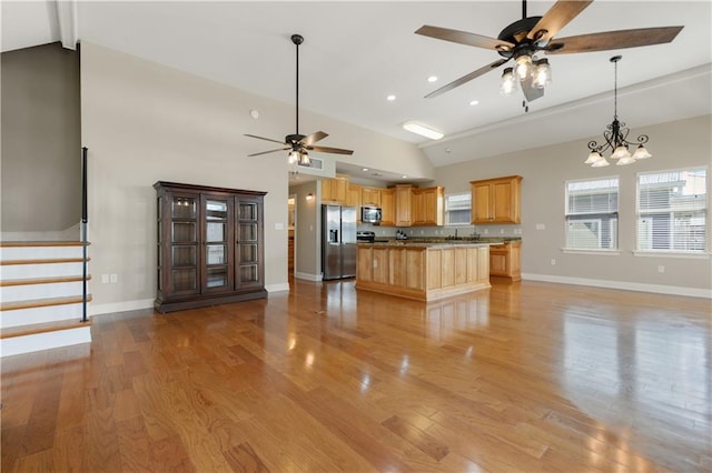 4027 Borneo St, Bay Saint Louis, MS 39520 - kitchen with ceiling fan, stainless steel appliances, open floor plan, light wood-style floors, and recessed lighting