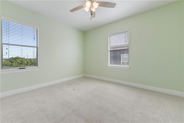 4027 Borneo St, Bay Saint Louis, MS 39520 - carpeted empty room with a ceiling fan and baseboards