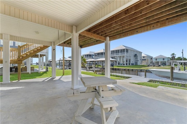 4027 Borneo St, Bay Saint Louis, MS 39520 - view of patio with a residential view and a water view