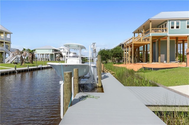 4027 Borneo St, Bay Saint Louis, MS 39520 - dock area featuring boat lift and a water view