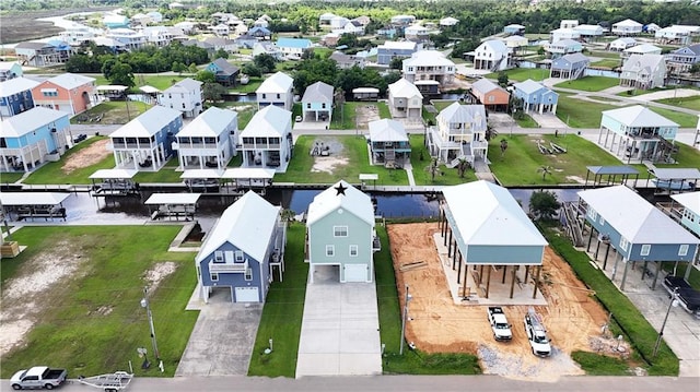 4027 Borneo St, Bay Saint Louis, MS 39520 - aerial perspective of suburban area featuring a nearby body of water