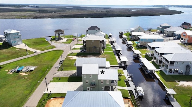 4027 Borneo St, Bay Saint Louis, MS 39520 - aerial view of residential area featuring a large body of water