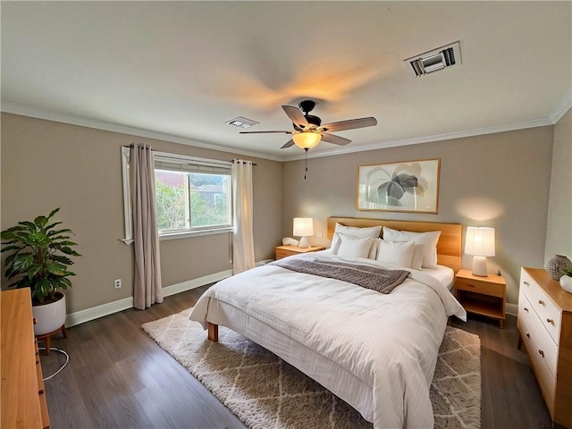 4508 Hessmer Ave, Metairie, LA 70002 - bedroom with baseboards, ornamental molding, dark wood-type flooring, and a ceiling fan