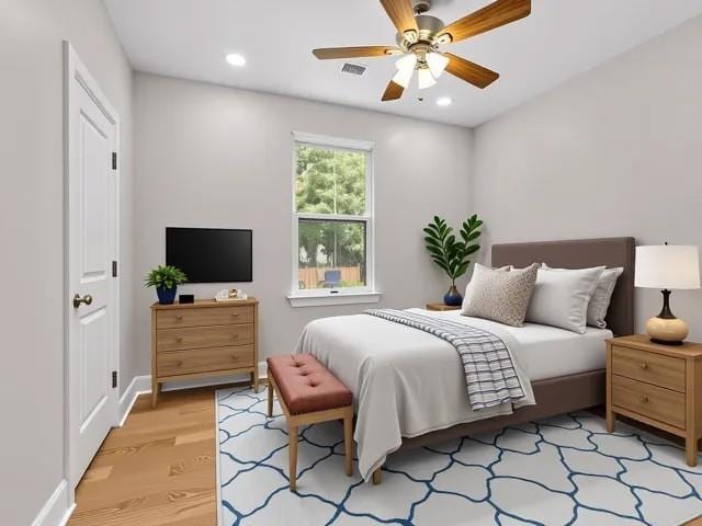 6100 Duplessis St, New Orleans, LA 70122 - bedroom featuring light wood-style flooring, recessed lighting, a ceiling fan, and baseboards