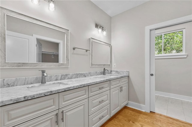 6100 Duplessis St, New Orleans, LA 70122 - full bath featuring double vanity and baseboards