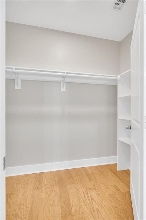 6100 Duplessis St, New Orleans, LA 70122 - walk in closet with light wood-style floors