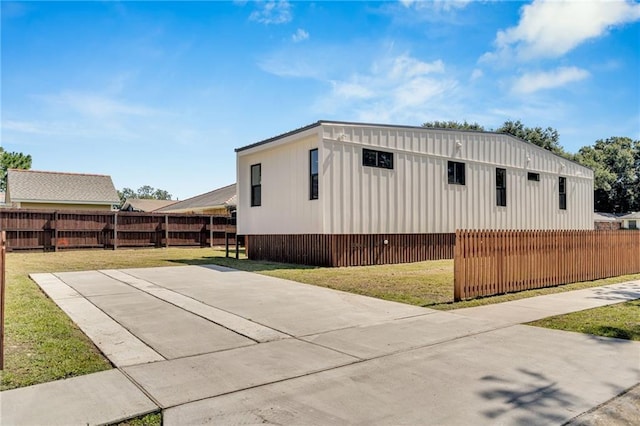 6100 Duplessis St, New Orleans, LA 70122 - view of home's exterior featuring board and batten siding
