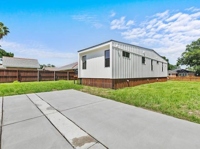 6100 Duplessis St, New Orleans, LA 70122 - back of house with a patio