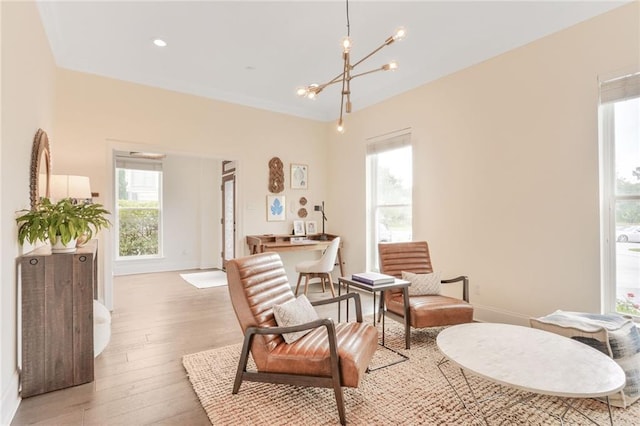 8 Ani St, New Orleans, LA 70124 - sitting room with a chandelier, light wood finished floors, and baseboards