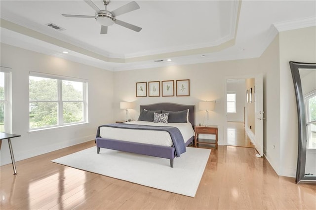 8 Ani St, New Orleans, LA 70124 - bedroom featuring a raised ceiling, ornamental molding, multiple windows, baseboards, and recessed lighting