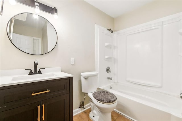 3309 4th St, New Orleans, LA 70125 - bathroom featuring toilet, tile patterned floors,  shower combination, vanity, and baseboards