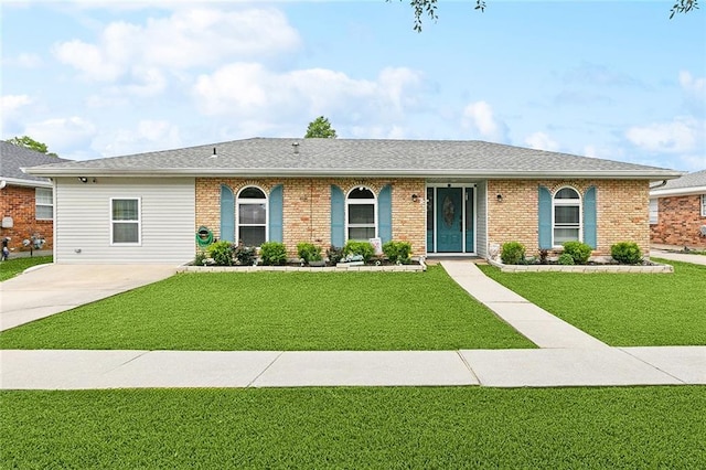 9 Osborne Ave, Kenner, LA 70065 - ranch-style home featuring a front yard and brick siding