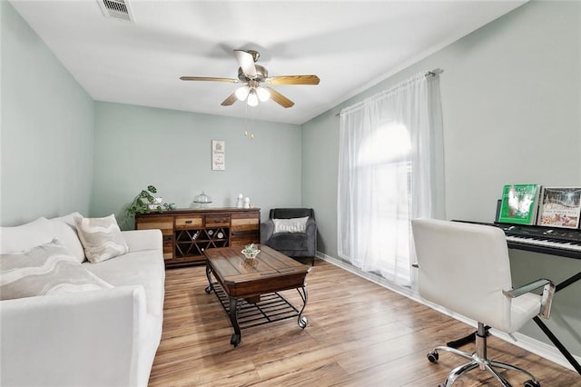 9 Osborne Ave, Kenner, LA 70065 - living area featuring light wood-type flooring and ceiling fan