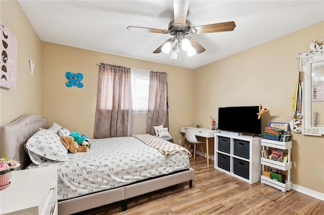 9 Osborne Ave, Kenner, LA 70065 - bedroom with wood finished floors, a ceiling fan, and baseboards
