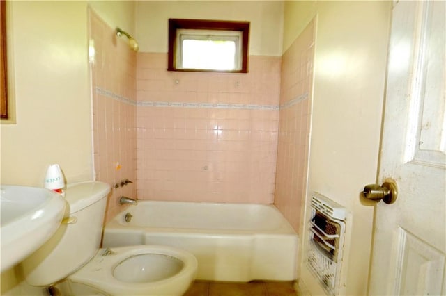 8018 Mackenzie St, New Orleans, LA 70128 - full bathroom with heating unit, shower / bath combination, toilet, and a sink