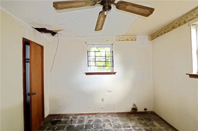 8018 Mackenzie St, New Orleans, LA 70128 - unfurnished room with a ceiling fan