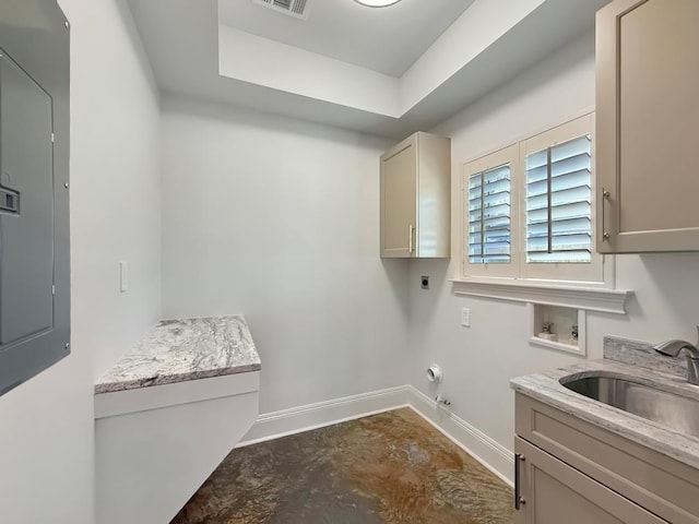 9125 5th St, River Ridge, LA 70123 - washroom with electric dryer hookup, washer hookup, cabinet space, baseboards, and gas dryer hookup