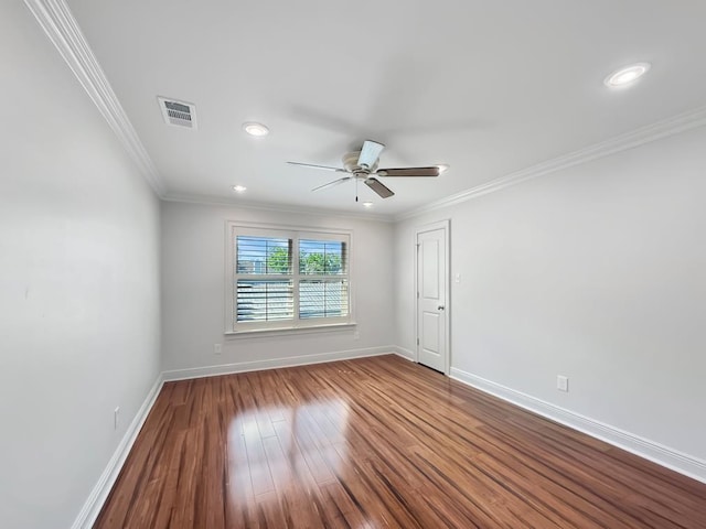 9125 5th St, River Ridge, LA 70123 - empty room with ceiling fan, wood finished floors, baseboards, recessed lighting, and crown molding