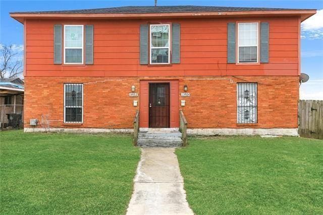 13700 N Nemours St, New Orleans, LA 70129 - view of front of house featuring brick siding