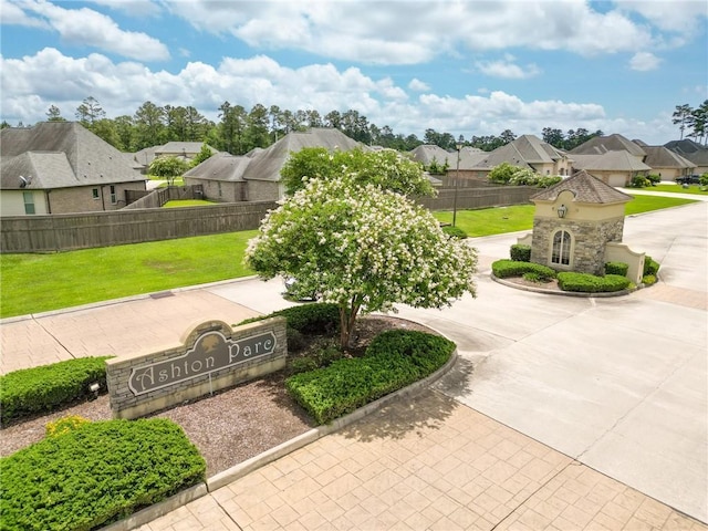 229 Louisiana Iris Cir, Slidell, LA 70458 - view of patio / terrace with a residential view and curved driveway