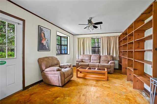 1532 Broadmoor Dr, Slidell, LA 70458 - living room featuring ceiling fan, ornamental molding, baseboards, and concrete flooring