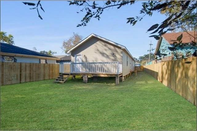 921 Andry St, New Orleans, LA 70117 - back of house with a deck