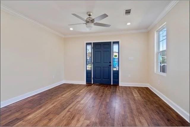 921 Andry St, New Orleans, LA 70117 - entrance foyer with wood finished floors, ornamental molding, baseboards, ceiling fan, and recessed lighting