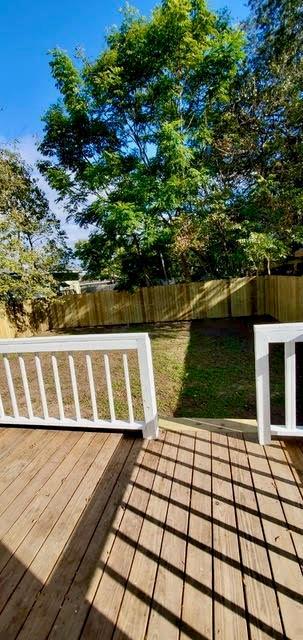 921 Andry St, New Orleans, LA 70117 - deck with a fenced backyard