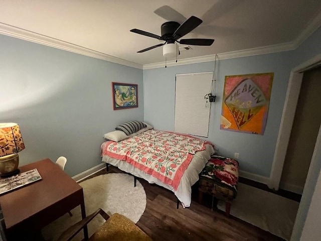 921 Andry St, New Orleans, LA 70117 - bedroom with wood finished floors, crown molding, baseboards, and a ceiling fan