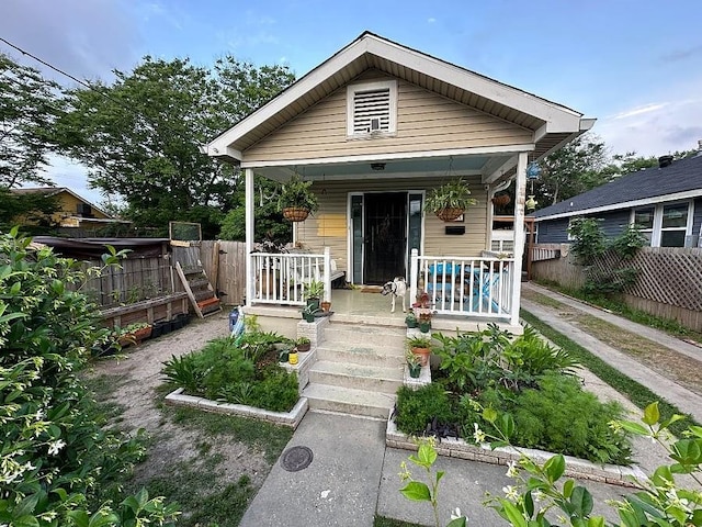 921 Andry St, New Orleans, LA 70117 - shotgun-style home with a porch
