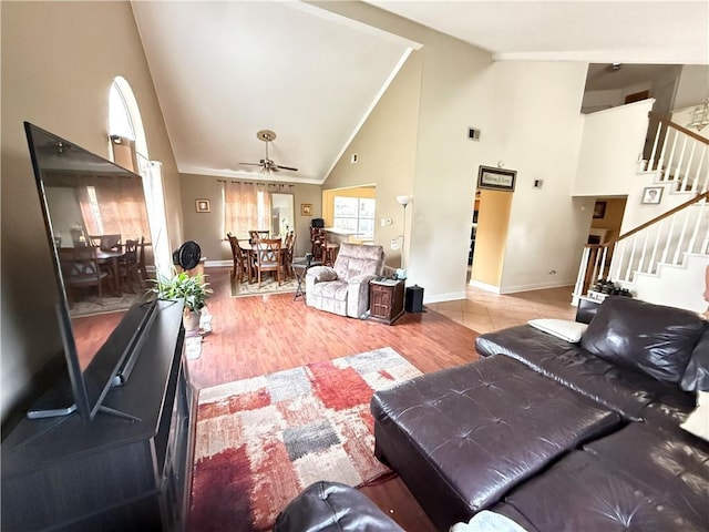 112 Cedarwood Dr, Slidell, LA 70461 - living area with stairway, high vaulted ceiling, a ceiling fan, baseboards, and ornamental molding
