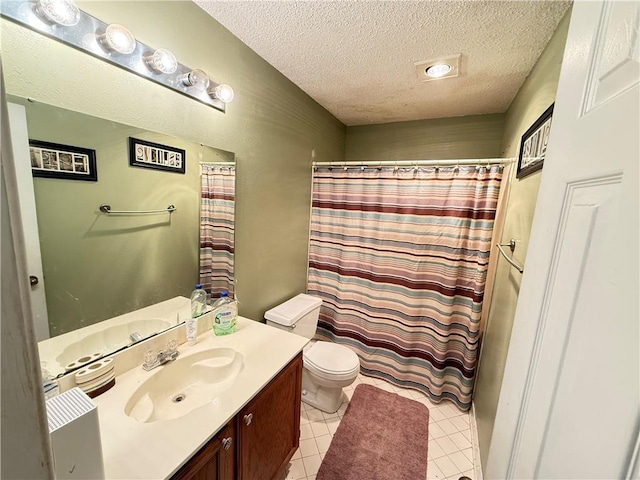 112 Cedarwood Dr, Slidell, LA 70461 - bathroom with a textured ceiling, vanity, tile patterned flooring, toilet, and a shower with shower curtain