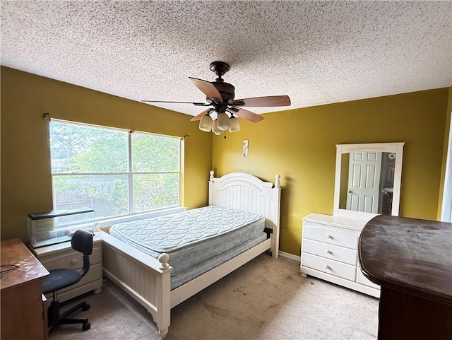 112 Cedarwood Dr, Slidell, LA 70461 - bedroom featuring carpet floors, ceiling fan, a textured ceiling, and a desk