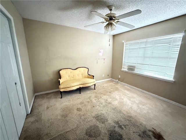 112 Cedarwood Dr, Slidell, LA 70461 - unfurnished room featuring carpet floors, ceiling fan, a textured ceiling, and baseboards