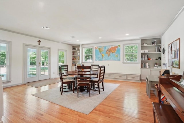 42 Riverdale Dr, Covington, LA 70433 - dining room with light wood-style flooring, french doors, healthy amount of natural light, and recessed lighting