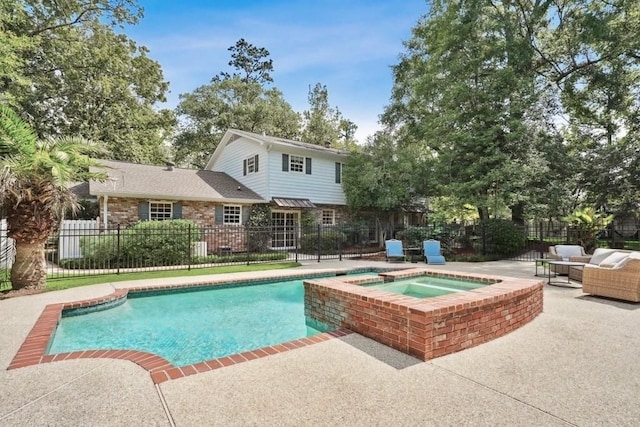 42 Riverdale Dr, Covington, LA 70433 - view of swimming pool featuring a patio and a pool with connected hot tub