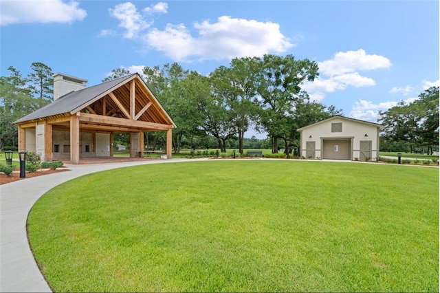 42 Riverdale Dr, Covington, LA 70433 - surrounding community with a yard and a garage