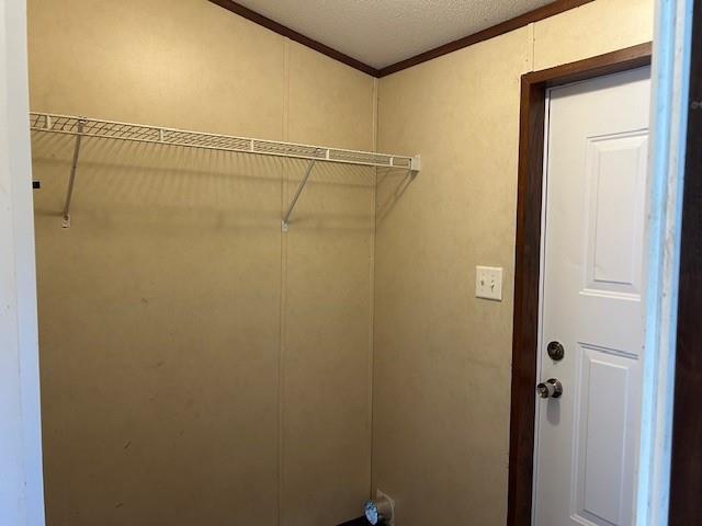 26214 E Sycamore St, Lacombe, LA 70445 - laundry area with ornamental molding