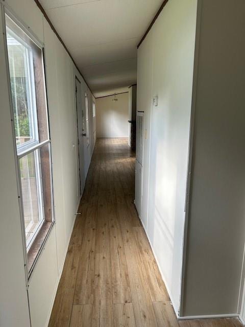 26214 E Sycamore St, Lacombe, LA 70445 - corridor featuring light wood-style flooring