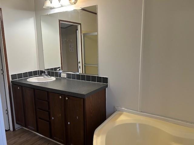 26214 E Sycamore St, Lacombe, LA 70445 - bathroom with a bath and vanity