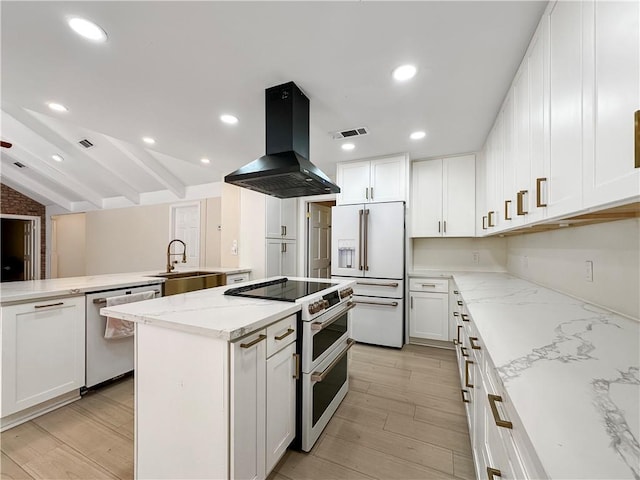 61258 N Military Rd, Slidell, LA 70461 - kitchen featuring island exhaust hood, white appliances, a sink, a kitchen island, and light stone counters