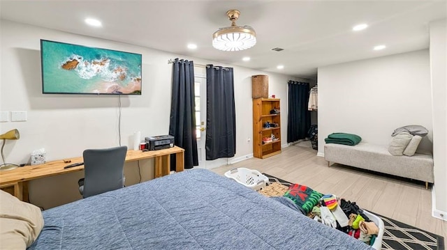 61258 N Military Rd, Slidell, LA 70461 - bedroom featuring wood finished floors, recessed lighting, and baseboards