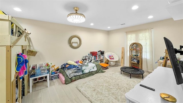 61258 N Military Rd, Slidell, LA 70461 - bedroom featuring wood finished floors and recessed lighting