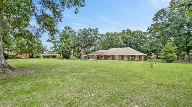 61258 N Military Rd, Slidell, LA 70461 - view of grassy yard
