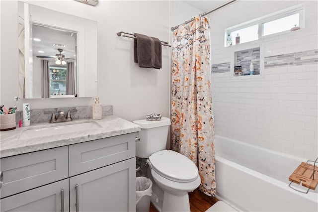 1101 Fairway Dr, Kenner, LA 70062 - full bath featuring vanity, plenty of natural light, toilet, and shower / bath combo with shower curtain
