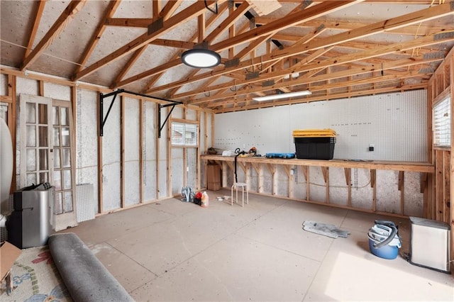 1101 Fairway Dr, Kenner, LA 70062 - garage with a workshop area and french doors